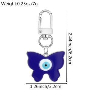 Detailed view of evil eye butterfly keychain with dimensions 3.2cm width and 6.2cm height