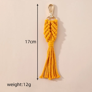 Detail of 17cm handmade ginger cotton keychain with golden lobster clasp and leaf texture