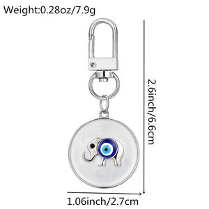 Detailed view of evil eye elephant keychain with measurements and weight specifications