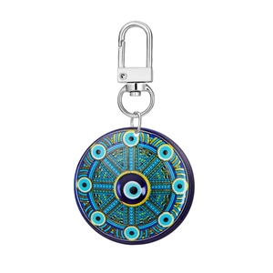 Detail of blue Nazar Evil Eye acrylic pendant with geometric patterns and silver metal clasp