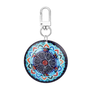 12-piece tribal acrylic keychain set with Hamsa Hand and Evil Eye mandala design