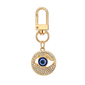12-piece evil eye keychain set in gold finish with sparkling rhinestones and blue nazar charm