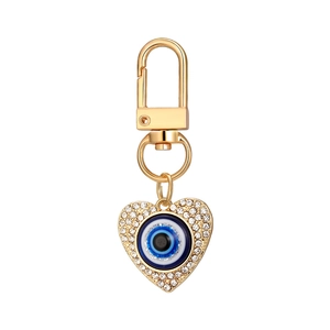 Golden heart-shaped evil eye keychain with sparkling rhinestones and rotating spring clasp