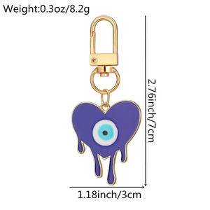 Vue détaillée du porte-clés cœur violet avec dimensions et poids de l'accessoire