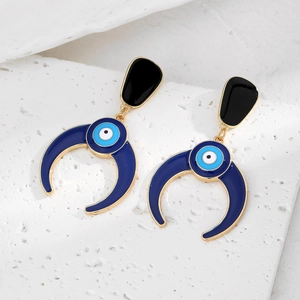 Boucles d'oreilles lune dorées vintage avec charms œil du diable et émail bleu