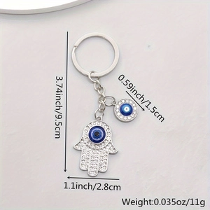 Detailed size specifications of silver Hamsa hand and blue Evil Eye keychain charm