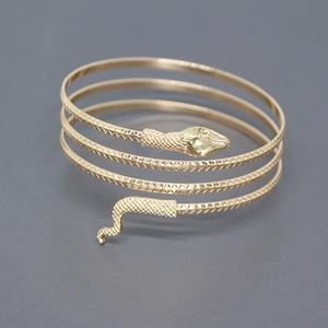 Bracelet manchette serpent doré vintage avec texture d'écailles réalistes pour femme