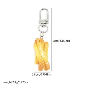 Miniature french fries keychain detail showing 8cm length and silver lobster clasp