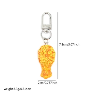 Detailed size view of realistic fried chicken leg keychain measuring 7.8cm in length