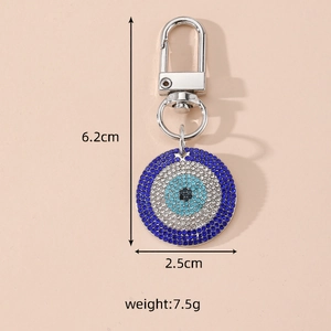 Detailed size view of sparkling blue evil eye keychain with rhinestones and dimensions