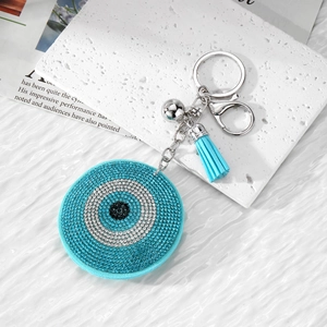 Blue rhinestone evil eye handbag charm with stylish silk tassel and silver keychain