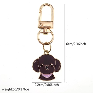 Dimensions détaillées du porte-clés chien teddy marron avec accessoires dorés