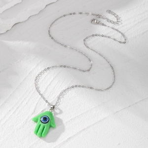 Hamsa hand necklace with blue evil eye pendant on a high-quality silver chain