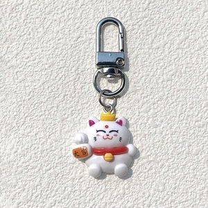 Simpatico portachiavi gatto portafortuna Maneki Neko con lingotto d'oro e gancio argento