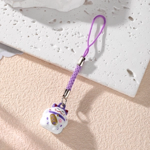 Japanese lucky cat charm with purple woven lanyard and ceramic Maneki Neko pendant