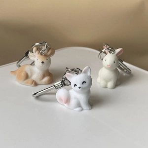 Cute resin animal keychains featuring a matte fox, deer, and rabbit with silver carabiners