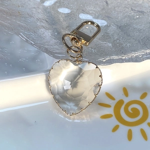 Chic transparent crystal heart pendant with gold metal edges and lobster clasp accessory