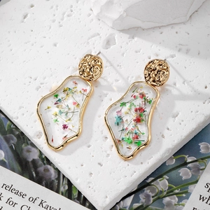 Bohemian gold geometric earrings with colorful dried flowers in transparent resin