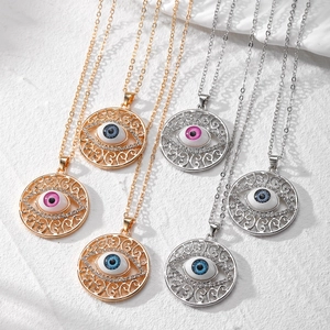 Collier Pendentif Œil Maléfique en Alliage Vintage pour Femme Rétro Ajouré Rond Orné de Strass Collier Longue Chaîne Bijoux