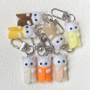 Cute flocked cat keychain set in seven assorted colors with silver metal lobster clasps
