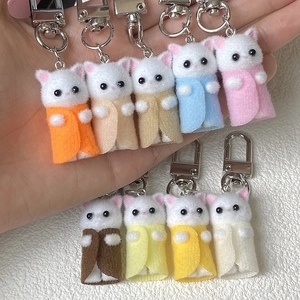 Adorable flocked cat keychains with colorful clothes and fuzzy kitten head charms