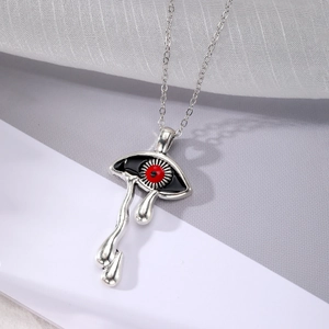 Gothic evil eye pendant necklace with red pupil and metallic teardrops on silver chain