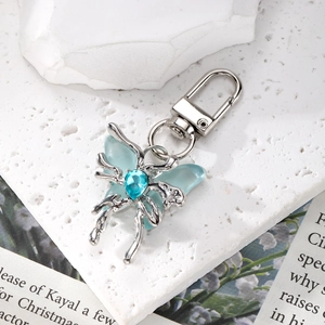 Exquisite crystal butterfly keychain with light blue wings and a teardrop gemstone accent