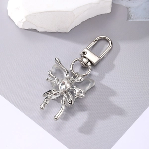 Elegant silver butterfly keychain with translucent wings and crystal pendant for bags