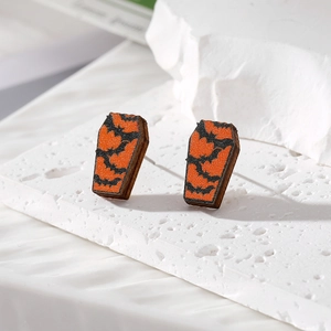 Detailed view of Halloween coffin wooden earrings featuring a dark bat pattern design