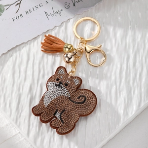 Porte-clés Shiba Inu en strass avec clochette dorée et gland en cuir marron élégant