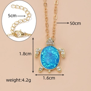 Detail of gold turtle pendant with blue opal shell and lobster clasp chain measurements