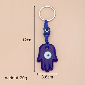 Detailed view of 12cm Hamsa Hand and Evil Eye glass keychain with size specifications
