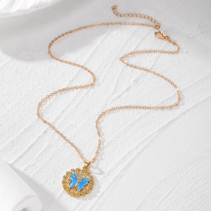 Elegant gold-plated butterfly pendant necklace with blue opal texture and small diamonds