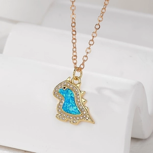 Chic gold-plated dinosaur necklace with blue opal inlay and sparkling rhinestones
