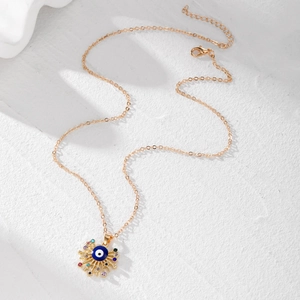 Ethno-Goldhalskette mit bösem Auge, bunten Kristallen und böhmischem Sonnenanhänger