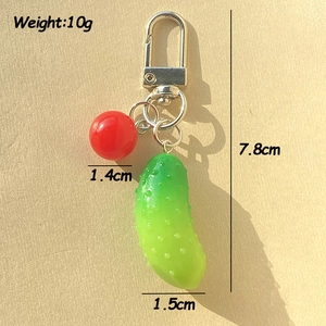 Detail view of resin pickle keychain with realistic texture and dimensions display