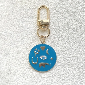 Ethnic blue enamel evil eye keychain with gold crescent moon and lucky star charms