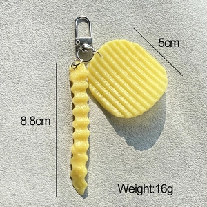 Detailed view of simulation potato chip keychain with 8.8cm fries and 5cm wavy chip charms