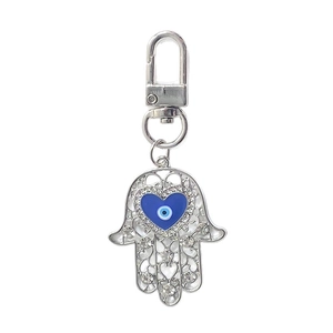 Vintage Hamsa Hand keychain with silver filigree, blue heart, and evil eye detail