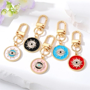 Porte-clés Mauvais Œil Bohême Rétro Alliage Strass Émail Géométrique Rond Œil Bleu Pendentif de Sac Femmes Bijoux Cadeau