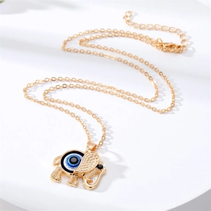 Collier vintage éléphant avec œil maléfique doré pour femme au style ethnique chic