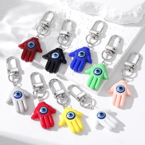 Porte-clés Main de Fatma Mauvais Œil Pendentif en Résine Alliage Amulette de Chance Style Ethnique Vintage Bijoux pour Sac Femme Homme