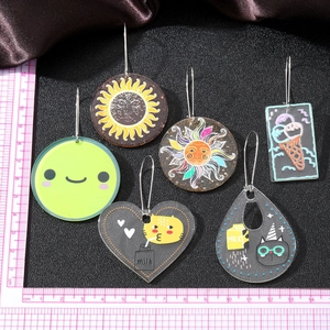 Set of 6 cute acrylic cartoon earrings with smiley sun cat and heart designs