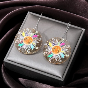 Minimalist acrylic sun face drop earrings with glitter and colorful flame patterns
