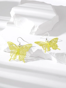 Vibrant neon yellow butterfly hollow drop earrings with intricate rose floral patterns