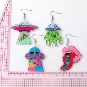 Quirky clear acrylic alien and UFO earrings with colorful painted cartoon designs