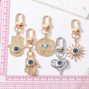 Hamsa Hand and Evil Eye Keychain Set with Heart and Pyramid Pendants in Gold and Silver