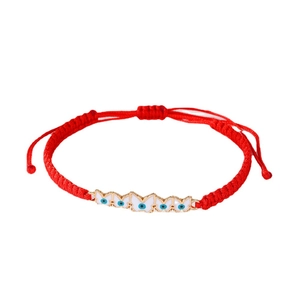 Handmade red braided cord bracelet with gold butterfly evil eye charm and enamel finish