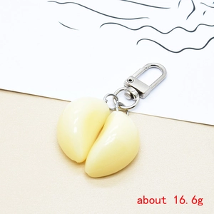 Detailed realistic garlic clove keychain made of resin with silver metal carabiner, 16.6g
