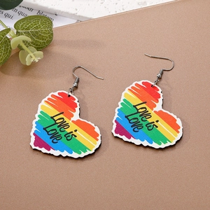 Rainbow wooden heart earrings featuring Love is Love slogan for women Pride jewelry